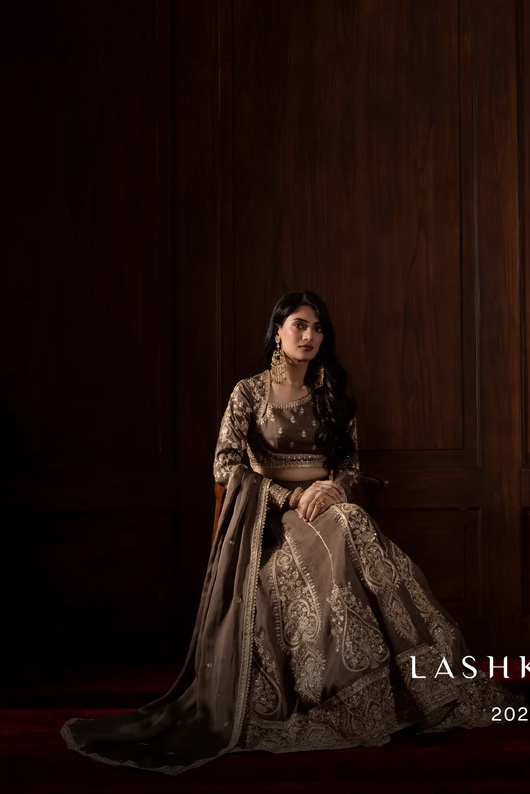Zariya lookbook cover: two looks in a wood-panelled room, left half